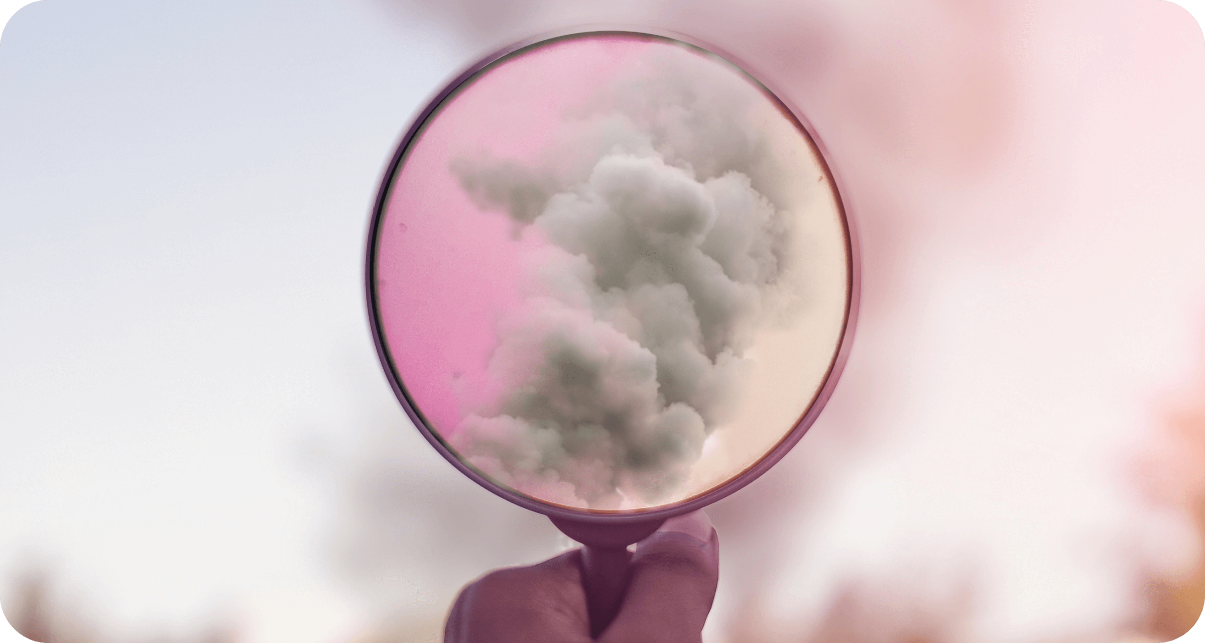 A plume of smoke seen through a magnifying glass